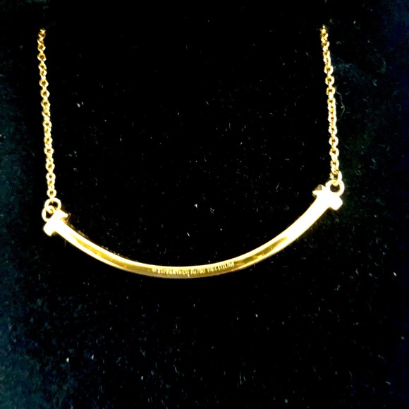 Tiffany & Co, Tiffany T 14K Gold Smile Necklace. Used ones are selling for $1050